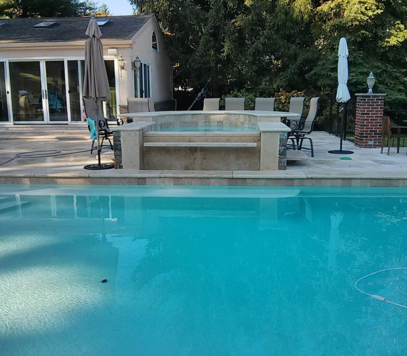 caramel travertine pool bar outdoor kitchen pool house