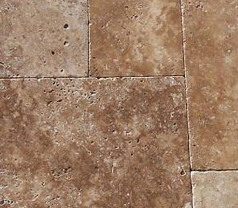 Noce Travertine with warm medium to darker brown tones.