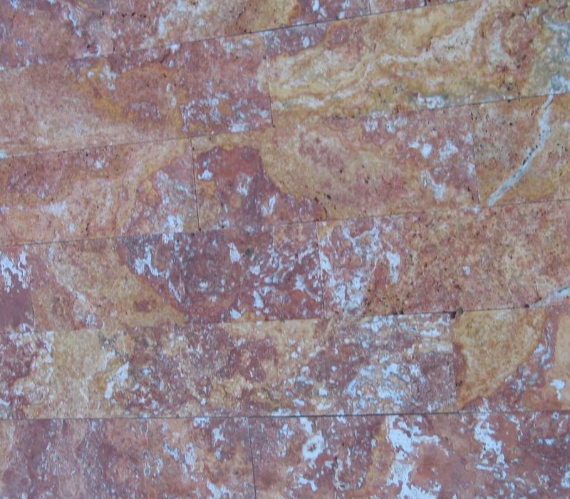 Peach blend travertine mix of reds, peach, cream and dark colors