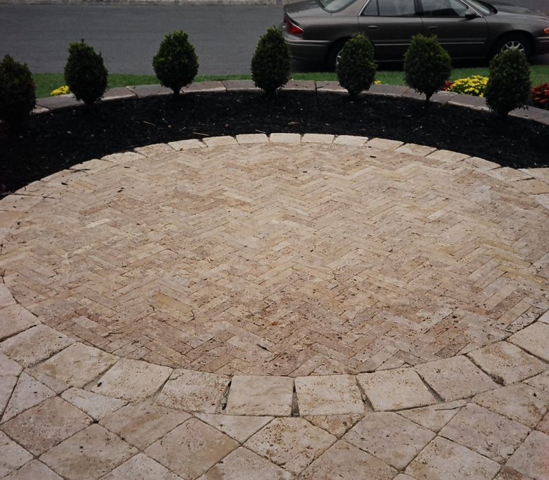 caramel travertine driveway "x8" and 2"x8" herringbone center